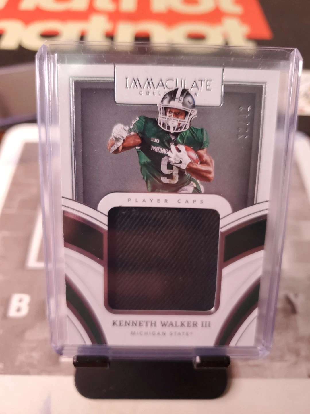 Kenneth Walker III Panini Immaculate Collection Collegiate Rps Rookie Player Caps #PCKWA Base