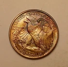"PQ" OBVERSE MULTI-TONED 1942 WALKING LIBERTY SUPERB BU 50c