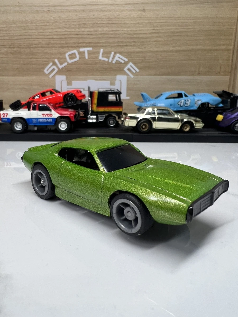 Voiture Slot Racing TYCO – Dodge Charger Police N°12 – Rare – Hong Kong