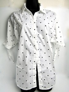 white shirt with black dots