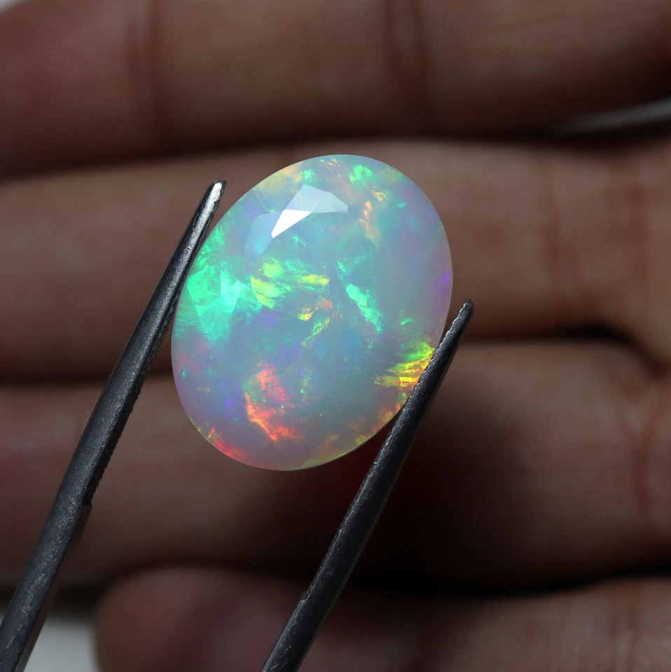 15 Cts 20.3x15.7x10.2 MM Real AAA Green Red Yellow Fire Ethiopian Opal Oval Cut - Image 3 of 4