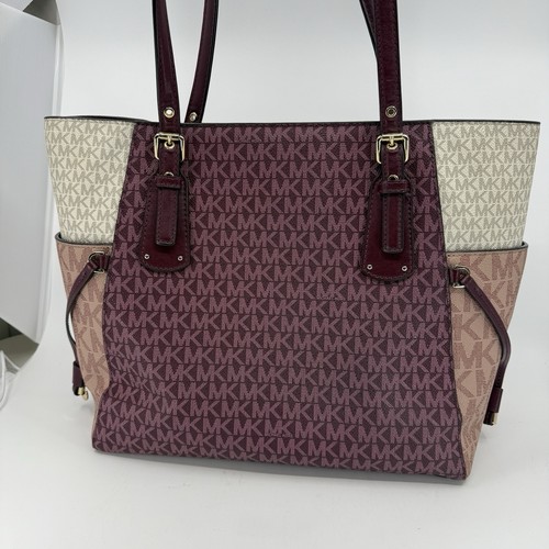 Borsa a tracolla Michael Kors Voyager e portafoglio pelle sangue di bue ciottoli - Foto 4 di 24