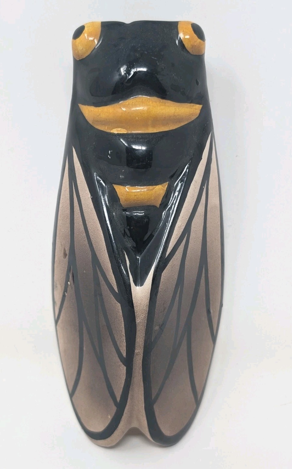 Hand-painted French majolica wall pocket vase shaped like a cicada.