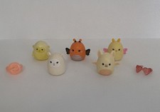 Squish-a-longs   5 set of yellow/orange figures   
