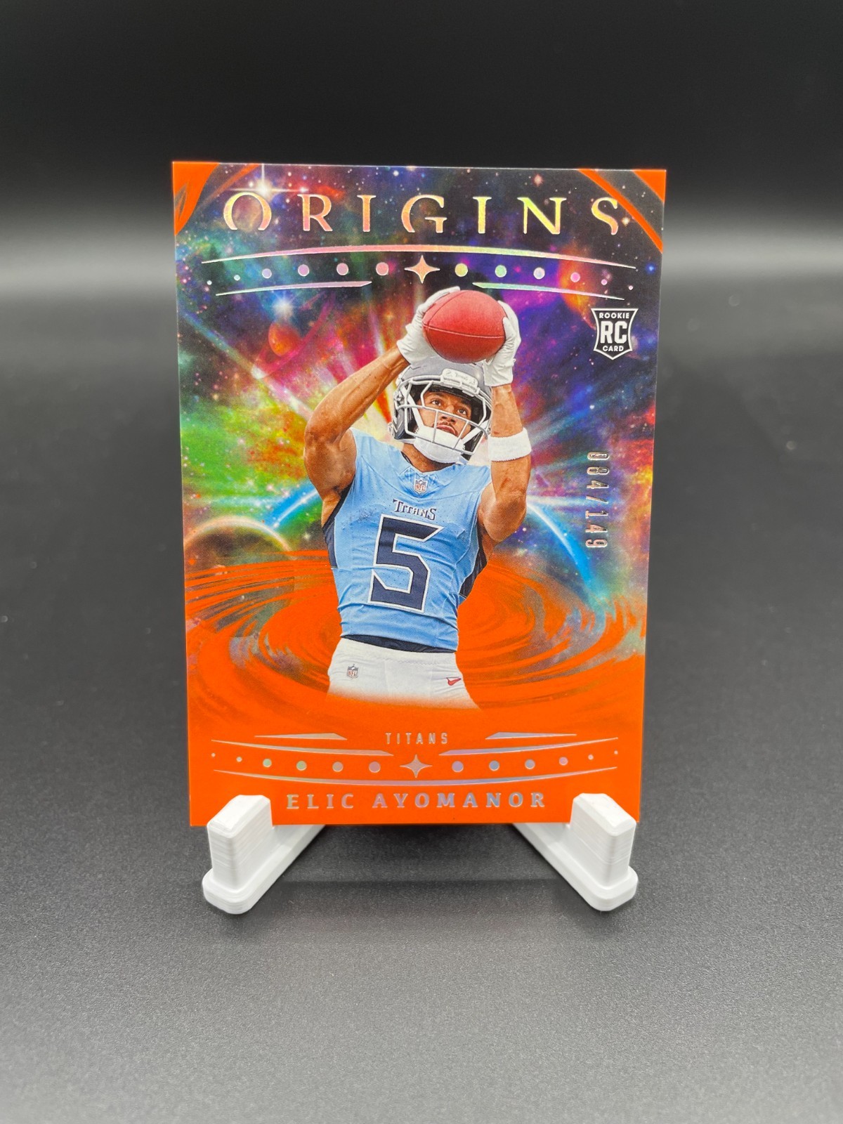 2025 Panini Origins - Elic Ayomanor #108 (RC) Rookie Orange 84/149 TEN TITANS