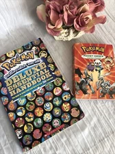 Pokemon Super Deluxe Essential Handbook & Pocket Comics paperback books