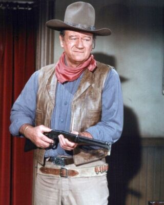 John Wayne means business pointing his Winchester rifle 24x36 poster Rio Lobo