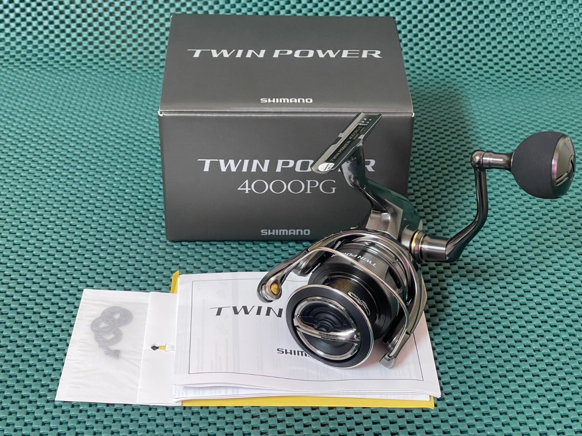 NEW SHIMANO 24 TWIN POWER 4000 PG SPINNING REEL 4.4:1 *1-3 NEW SHIMANO 24 TWIN POWER 4000 PG SPINNING REEL 4.4:1 *1-3