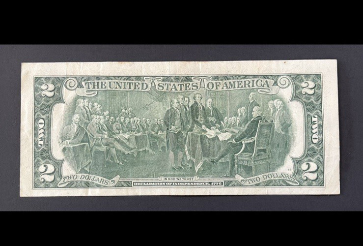 ERROR $2 DLL BILL - MISCUT, WIDE TOP AND LEFT, SERIAL #: 1997XXXX, SERIES 1976.