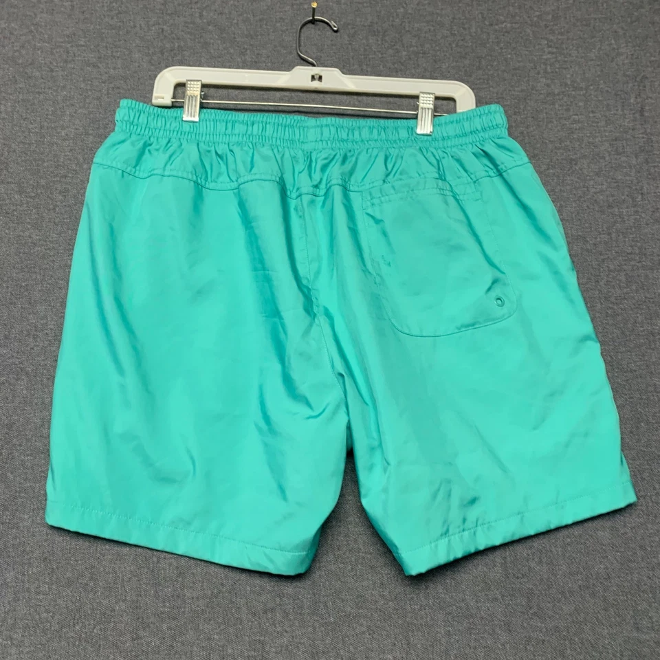 Pantalones cortos de natación forrados de malla con cordón verde azulado talla XL de secado rápido Nike para hombre Foto 2 de 4