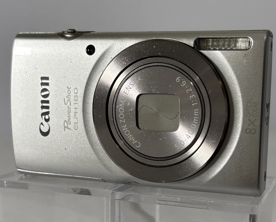 Cámara digital Canon PowerShot ELPH 180 20 MP - plateada - cargador, tarjeta, estuche Foto 3 de 4