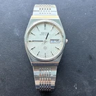 Seiko Grand Quartz Men's Vintage Day/Date Silver Dial Steel Bracelet Watch