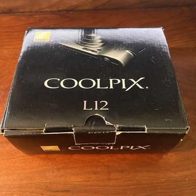 Nikon Coolpix L12 7.1MP Digital Compact Camera In Original Box Manuals Software