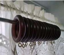 15 Wooden colour plastic curtain rings with Silver metal hooks(Etsy)
