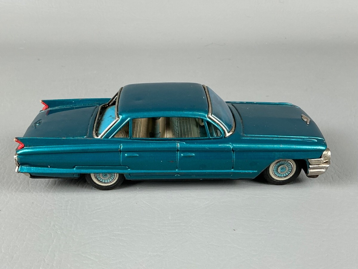 1960s Bandai Cadillac 4-Door Sedan Hard Top Tin Friction Car 1960s Bandai Cadillac 4-Door Sedan Hard Top Tin Friction Car