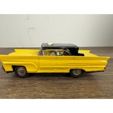 Vintage Yellow Taxi Tin Friction Car Made in Japan Lithograph Toy Sedan