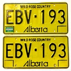 PAIR 1984 Alberta Passenger License Plates EBV-193 (natural)