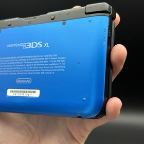 Nintendo 3DS XL Blue & Black Console w/ Charger, Stylus, SD Card & Mario Dream