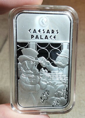 1 oz .999 SILVER BAR UNCLE SCROOGE McDUCK CASHING IN AT CAESARS