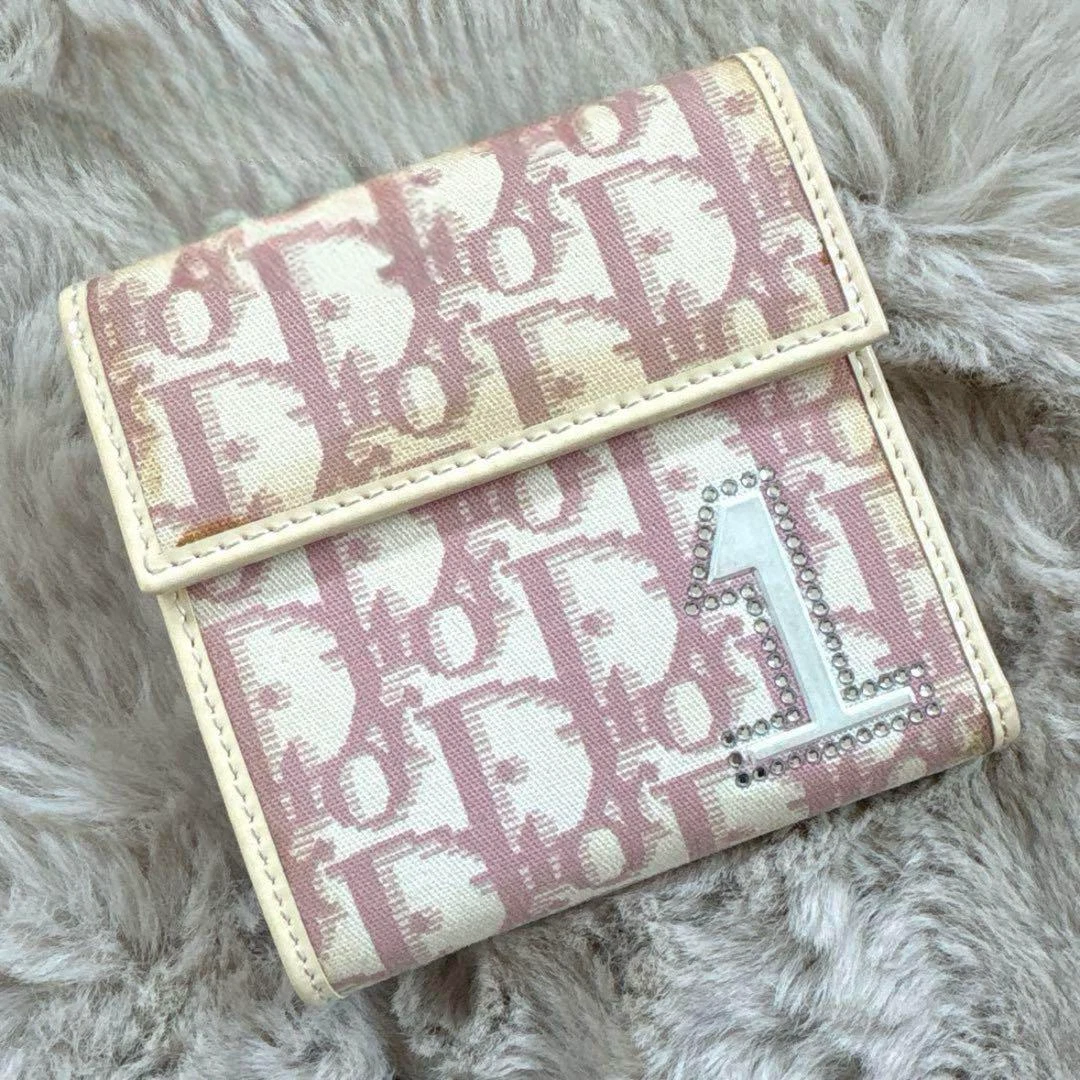 Portefeuille Christian Dior motif trotteur rose triple pli sans accessoires du Japon