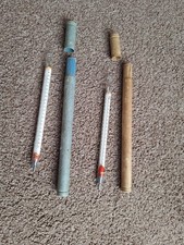 Floating dairy thermometer pair in original cases