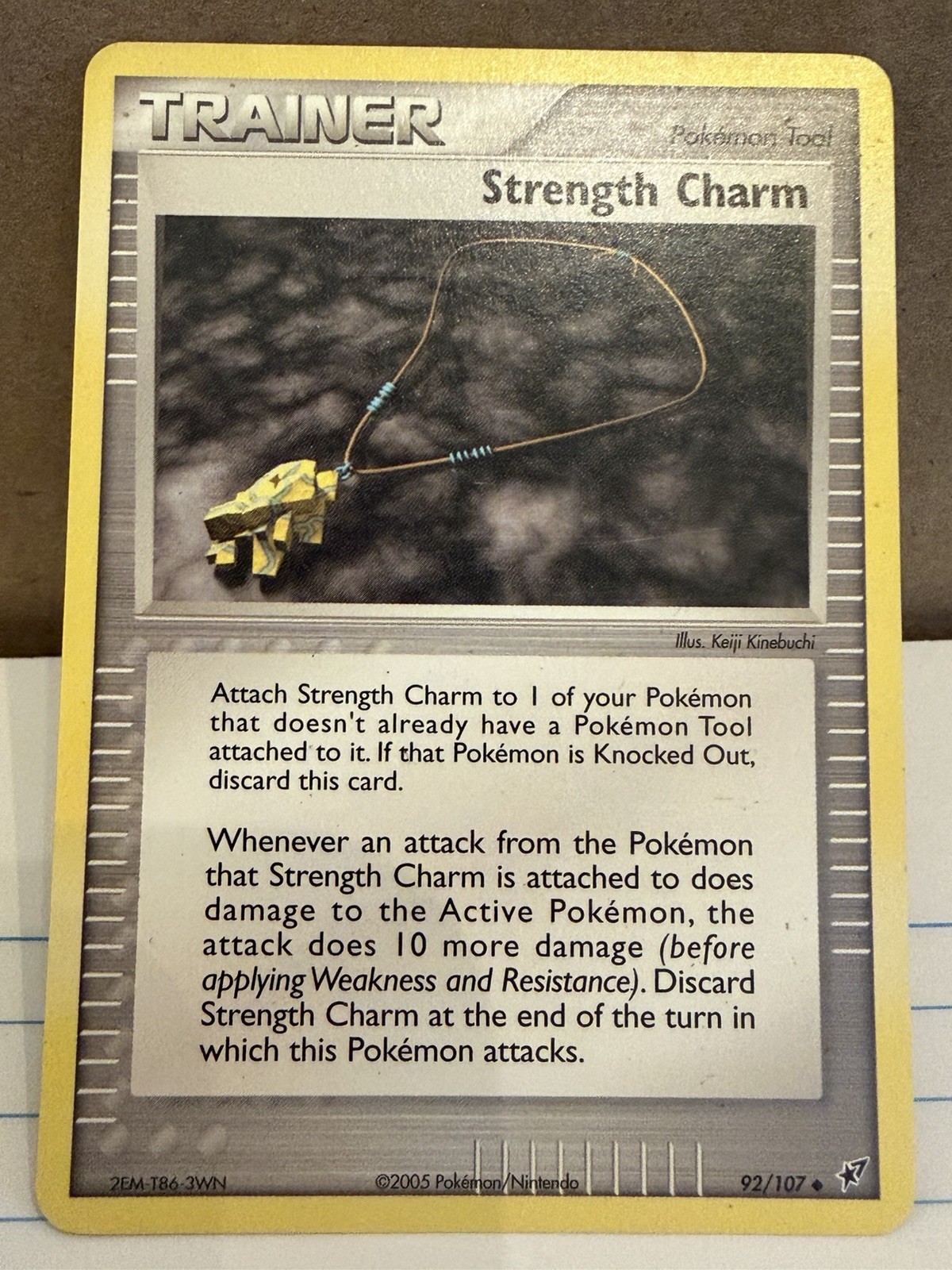 Strength Charm 92/107 Deoxys Regular
