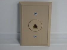 SE-43A phone jack attached to a cover beige in color