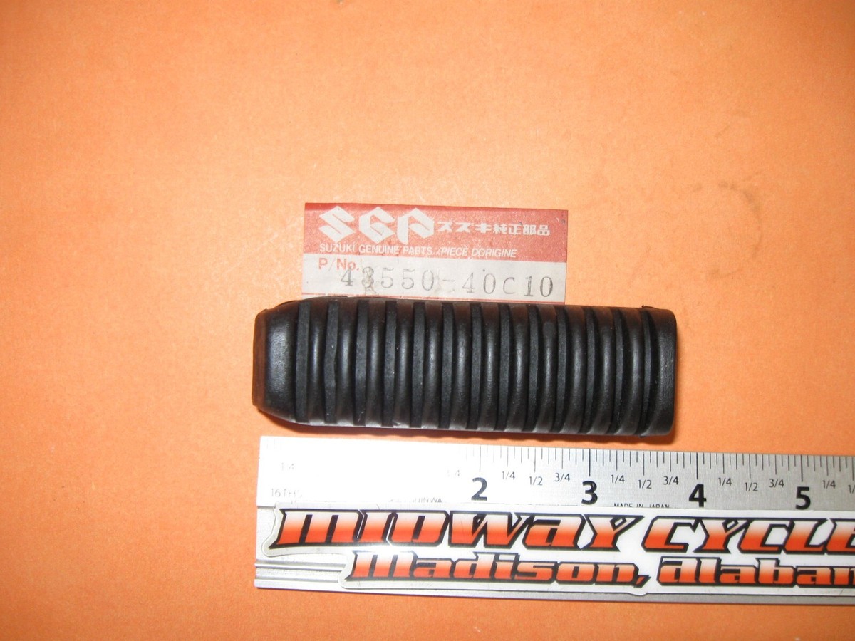 SUZUKI GSF1200 GSX-R1100 RF600 900 NOS OEM REAR FOOTREST SUZUKI GSF1200 GSX-R1100 RF600 900 NOS OEM REAR FOOTREST