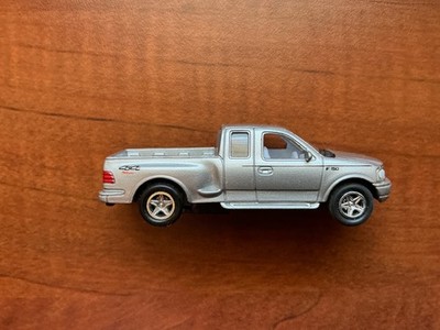 WELLY 1/64 Scale Diecast FORD F-150 Flareside Supercab Silver Pickup Truck