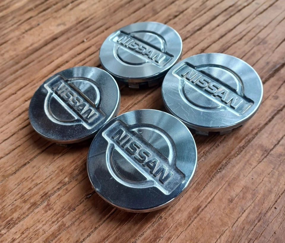 Juego de 4 tapas centrales Nissan Altima Máxima Sentra, 1995-1999 p/n 40342 40U10 Foto 2 de 3