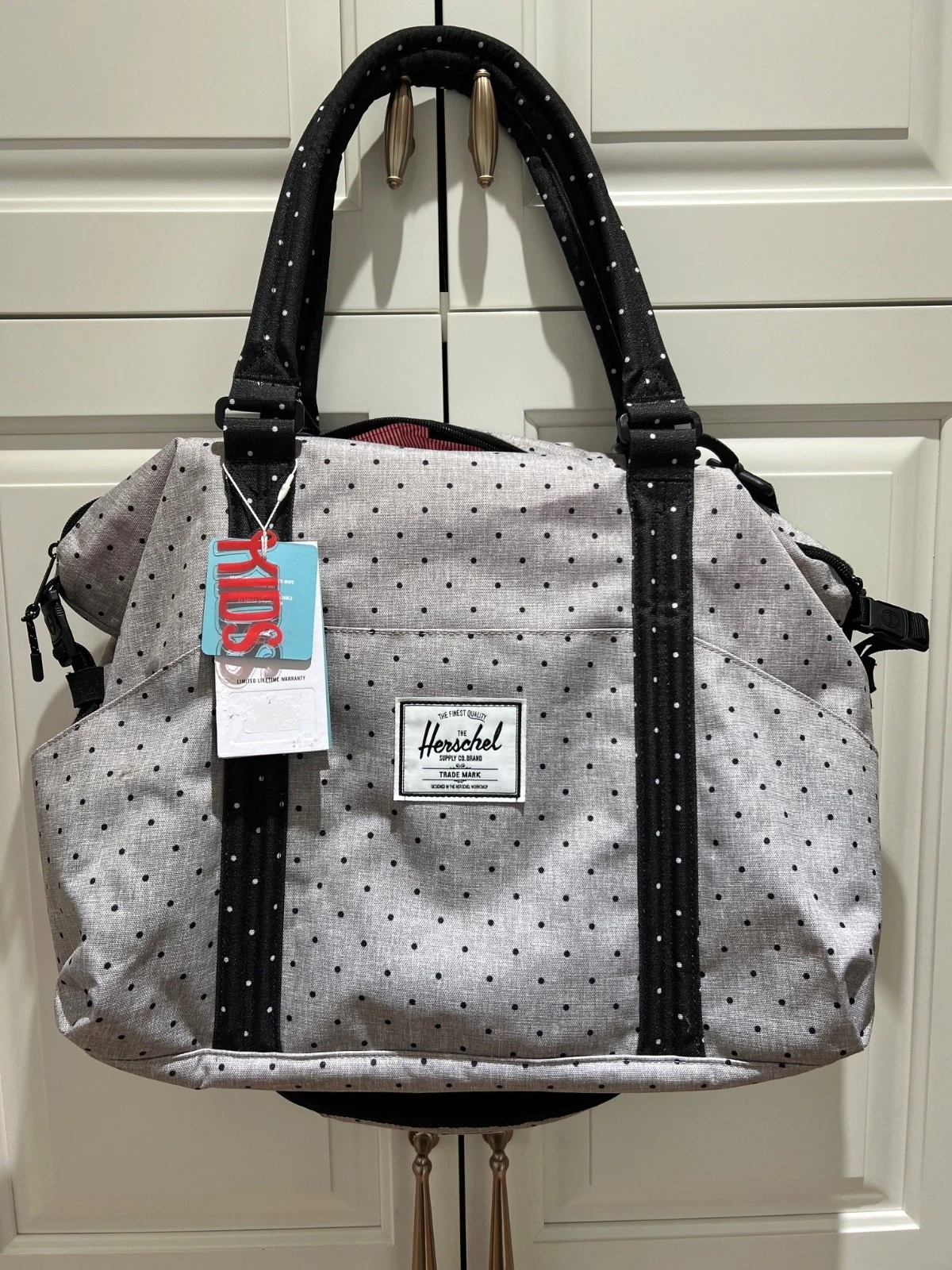 Herschel Gray & Black Polka Dot Diaper Strand Sprout Bag/Easy Wipe Changing Mat
Opens in a new windo