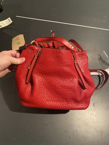 small red shoulder bag
