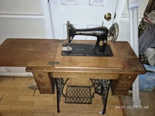 Antique Singer Sewing Machine 1910 model Red Eye 66 with table Local pickup N.J.