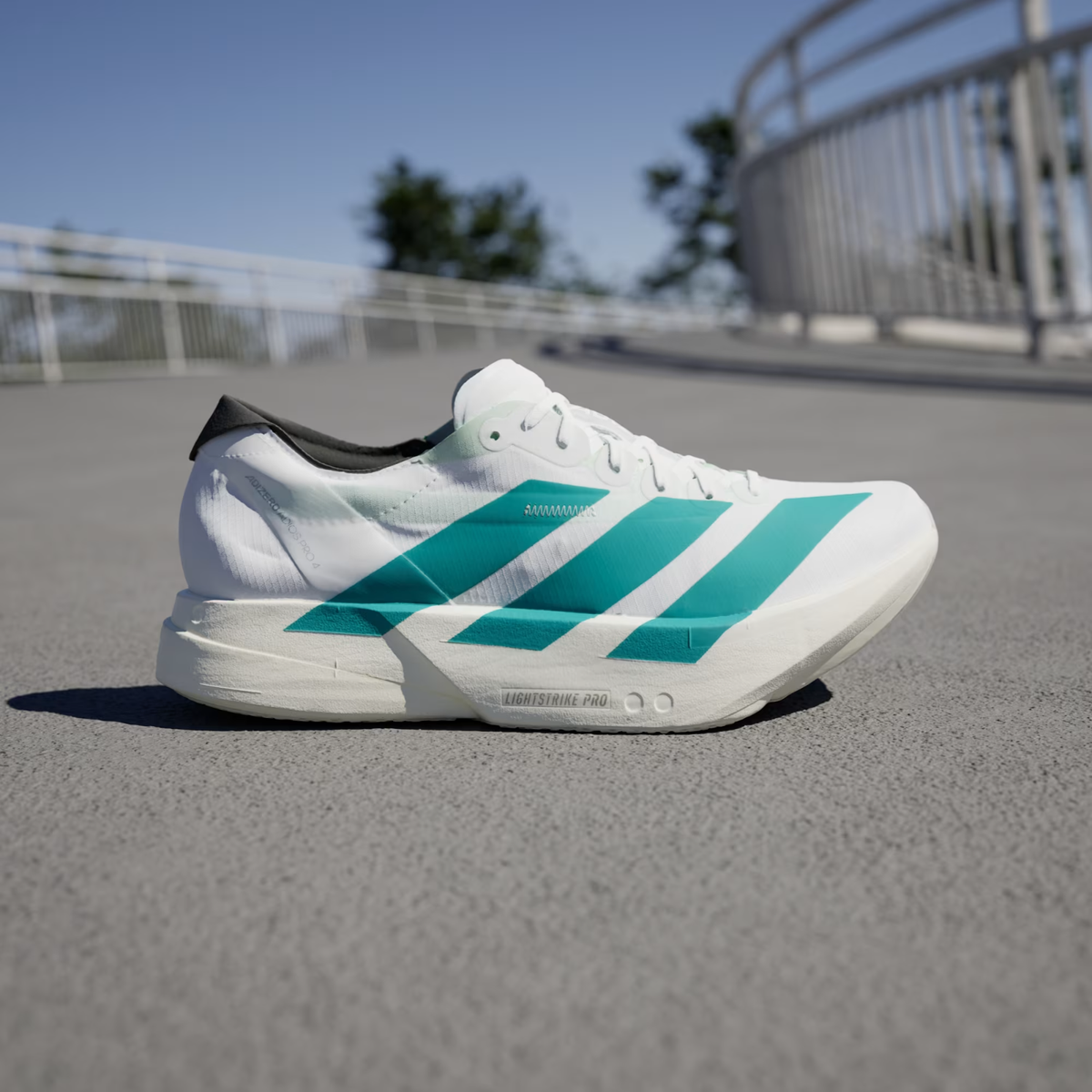 Adizero Adios Pro 4 Running Shoes in Cloud White/Pure Teal 