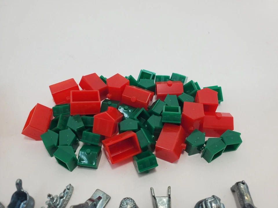 Repuesto Monopoly 11 Piezas Fichas de Peltre Casas Dinero Hoteles Foto 3 de 4