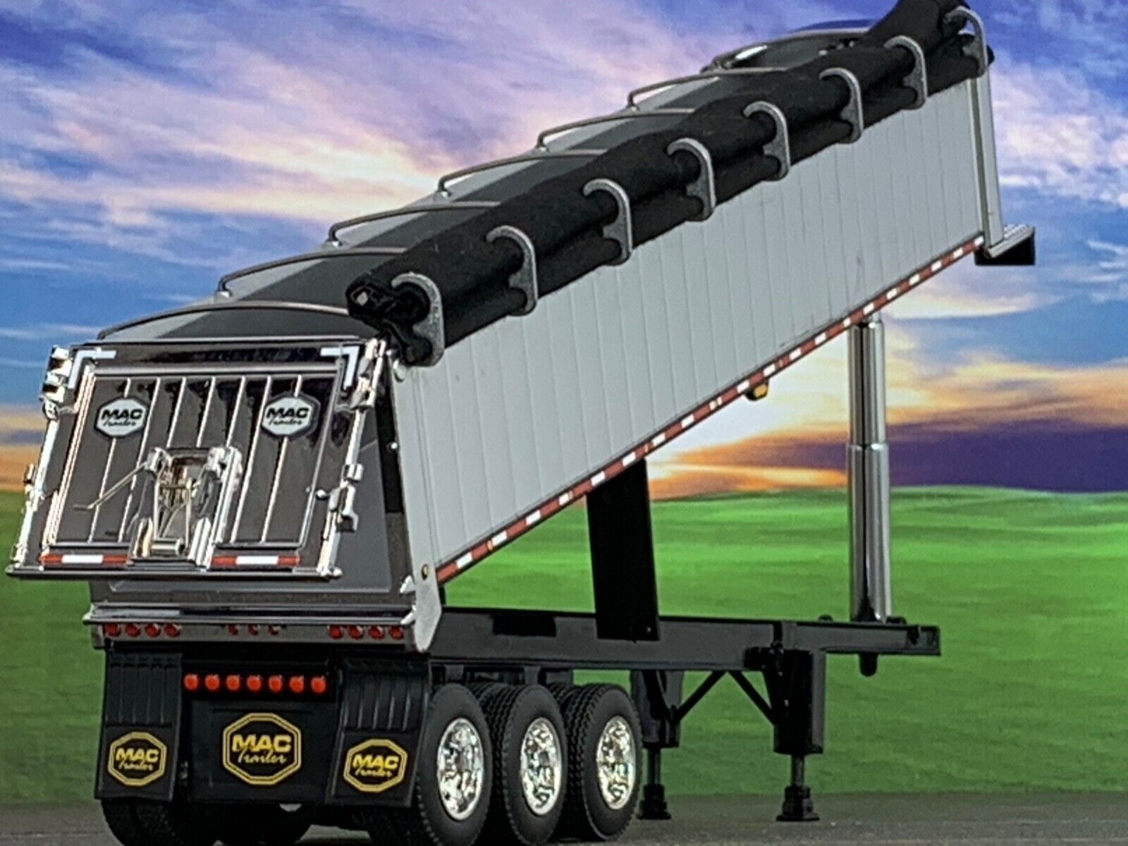 1/64 DCP CHROME MAC TRI AXLE END DUMP TRAILER W/ BLACK TARP