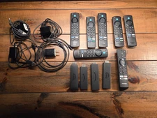 Lot of 4 Amazon Fire Stick Devices and 7 Remote Controls