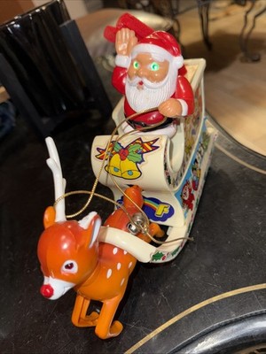 Vtg Santa In Sleigh Electronic Musical, doesn't move & one antler is broken