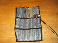 a lot of knitting, sewing, crocheting needlecrafts needles and hooks etc.