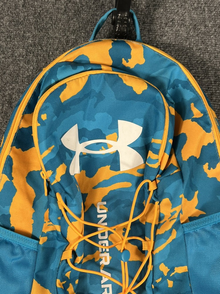Under Armour Hustle Sport Backpack Blue Yellow Camo Bungee Front Logo Unisex