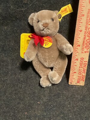 Vintage Steiff Bear color is Caramel with red ribbon about 5  tall #0202/14.