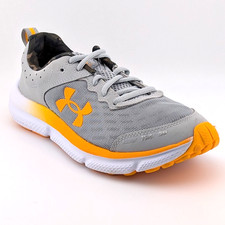 Under Armour Unisex's Grade School Assert 10 Running Shoe Size 5Y Grey/Orange