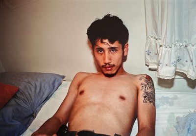 Nan Goldin (1953- ) - Kee in bed - E. Hampton, N.Y. - 1988 - signed Chibachrome