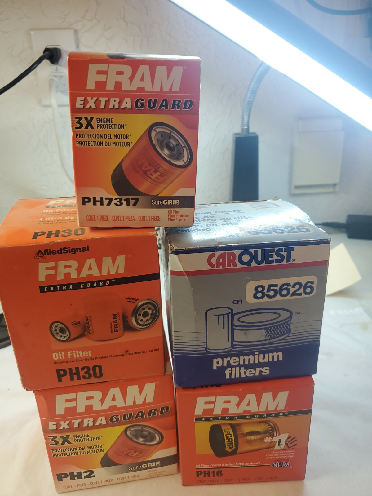 1 Carquest  4 Fram Oil Filter Lot  5 New Filters 