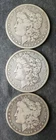 1883 O, 1887 O, and 1889 O $1 Morgan Silver Dollars