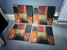 4 Pimpernel cork-backed placemats featuring an abstract red, black, and orange