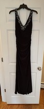 Xscape Sleeveless Black Evening / Prom Gown featuring Jeweled Neckline -Size 6