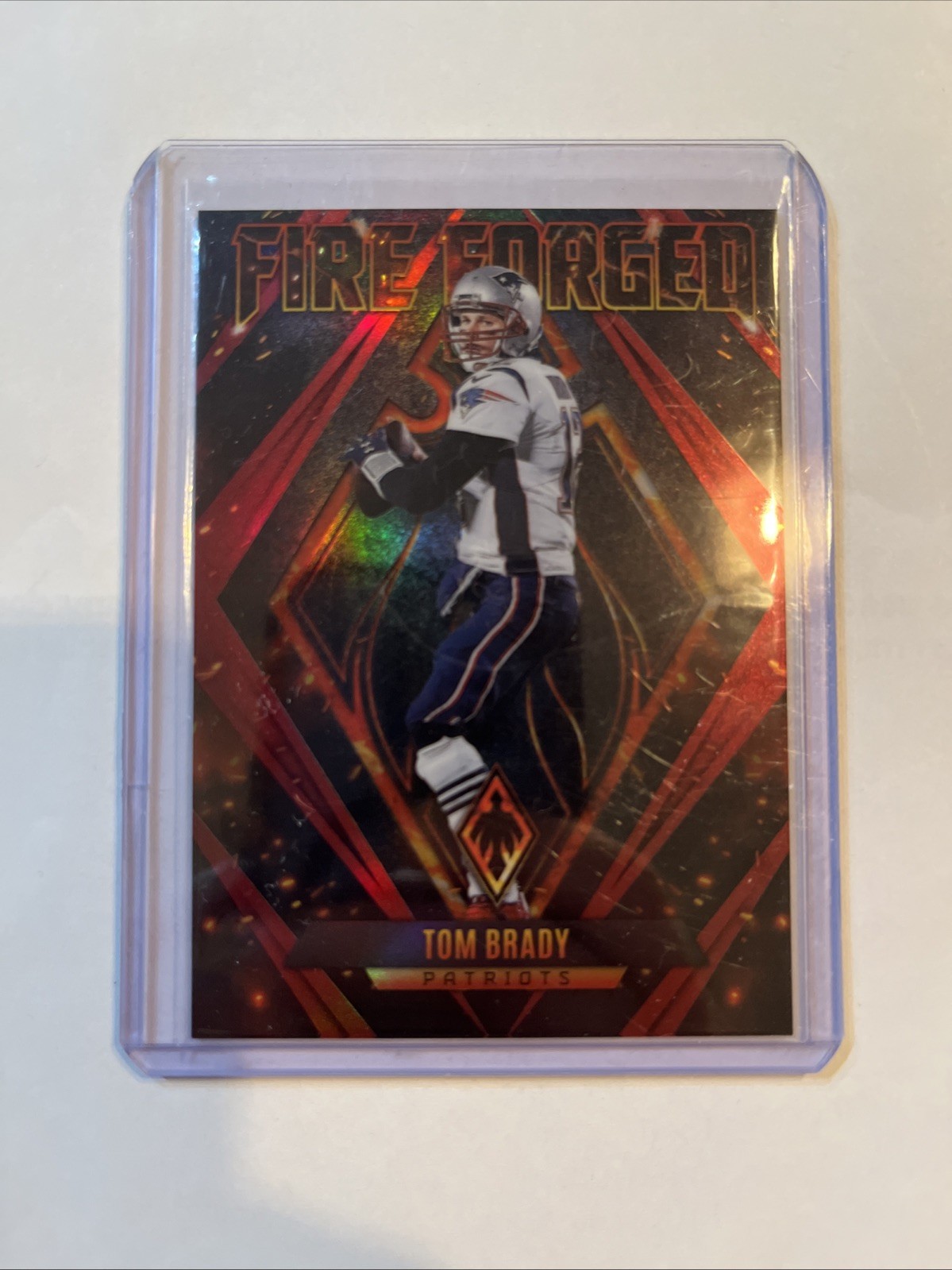 2022 Panini Phoenix - Fire Forged Tom Brady #FF-1 Red /199