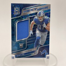 2022 Spectra - Next Era Aidan Hutchinson #NE-AHU Neon Blue Prizm /60 (MEM, RC)
