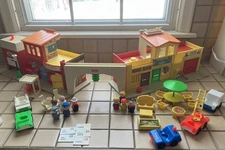 Vintage 1970s Fisher-Price set #997 Play Family Village, almost complete
